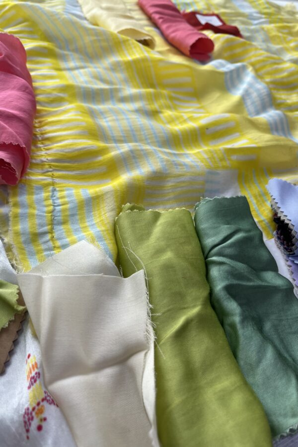 Arya Giri artisanal fabrics celebrating natural textures and craftsmanship.
